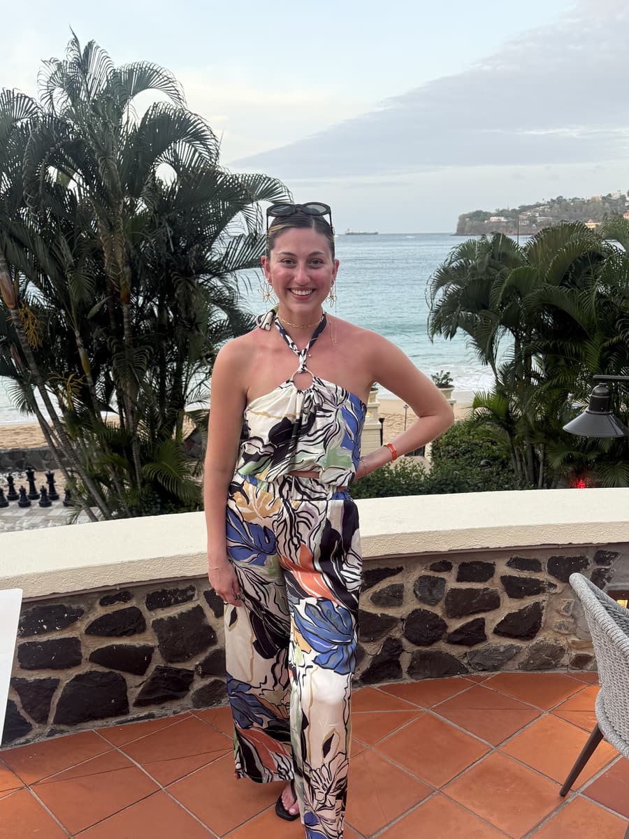 Juliana on a terracotta terrace above the Caribbean sea