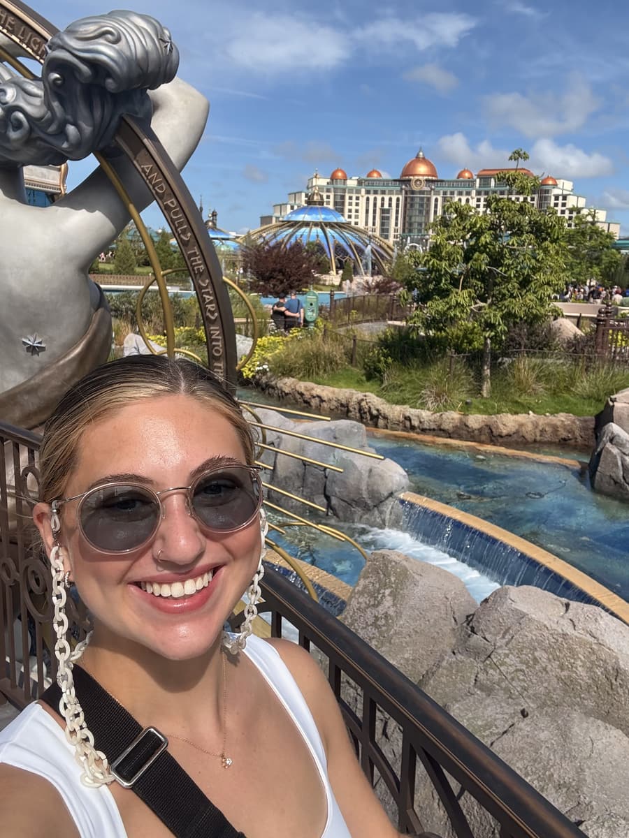 Juliana in front of a fountain at Universal